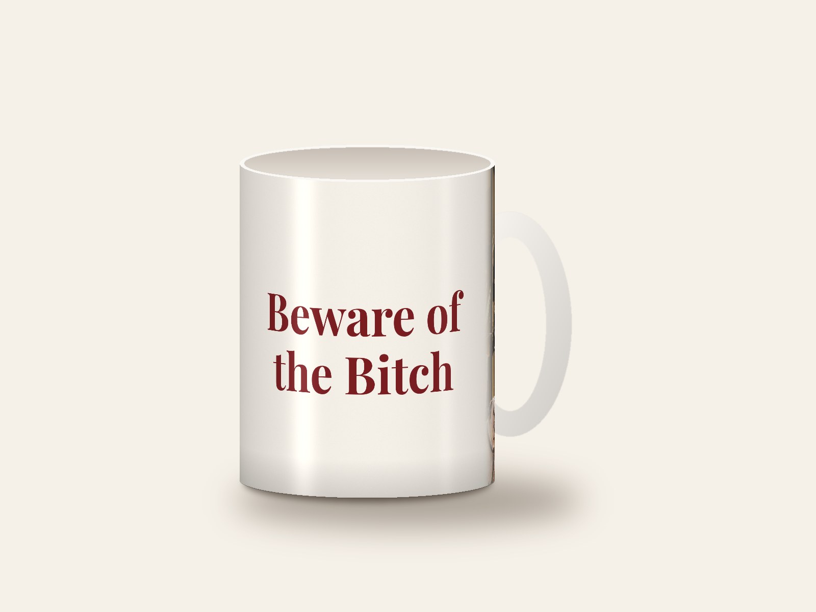 White mug printed with the design Beware of the Bitch