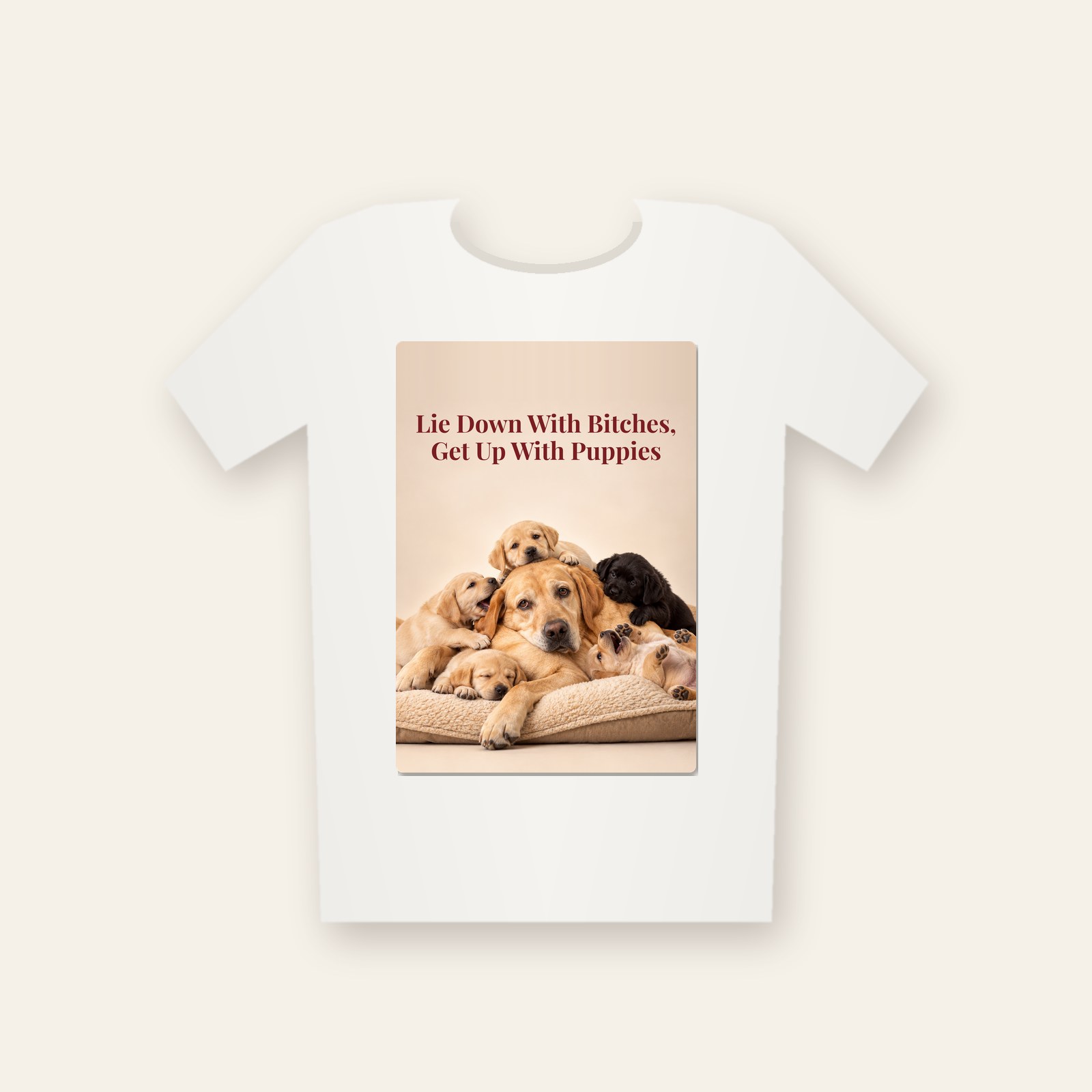 White tee printed with the design Lie Down With Bitches, Get Up With Puppies
